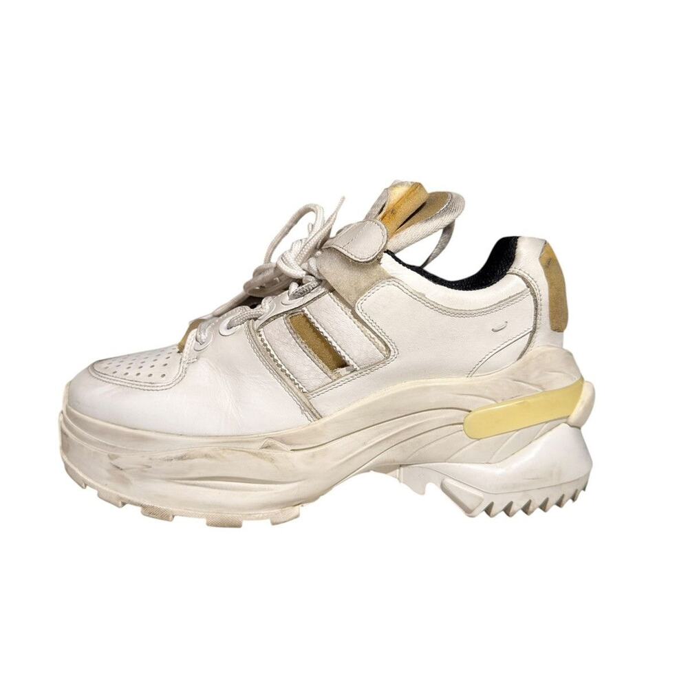“Worn” look strap sneaker